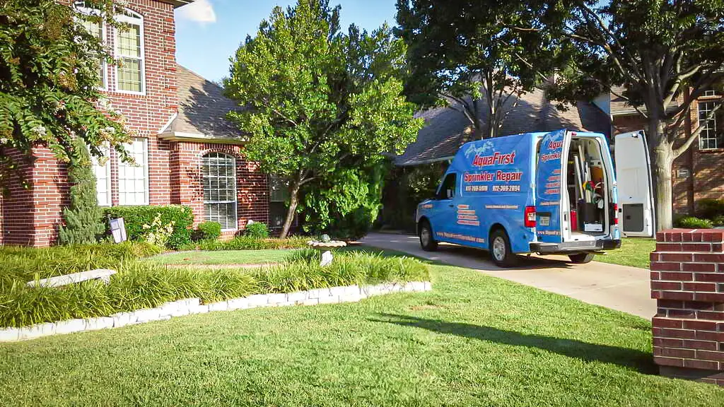 AquaFirst Sprinkler Repair truck in front of the home of one of our valued customers.